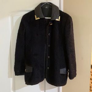 Gianni Versace couture black leather and fauxe fur type made in Italy